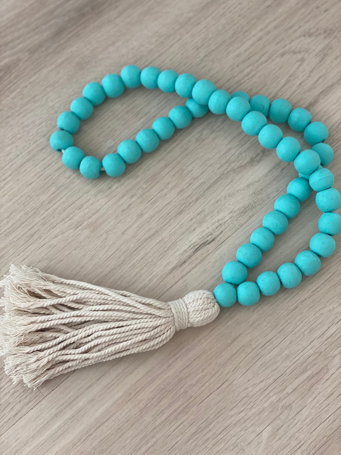 Wooden beads with tassel