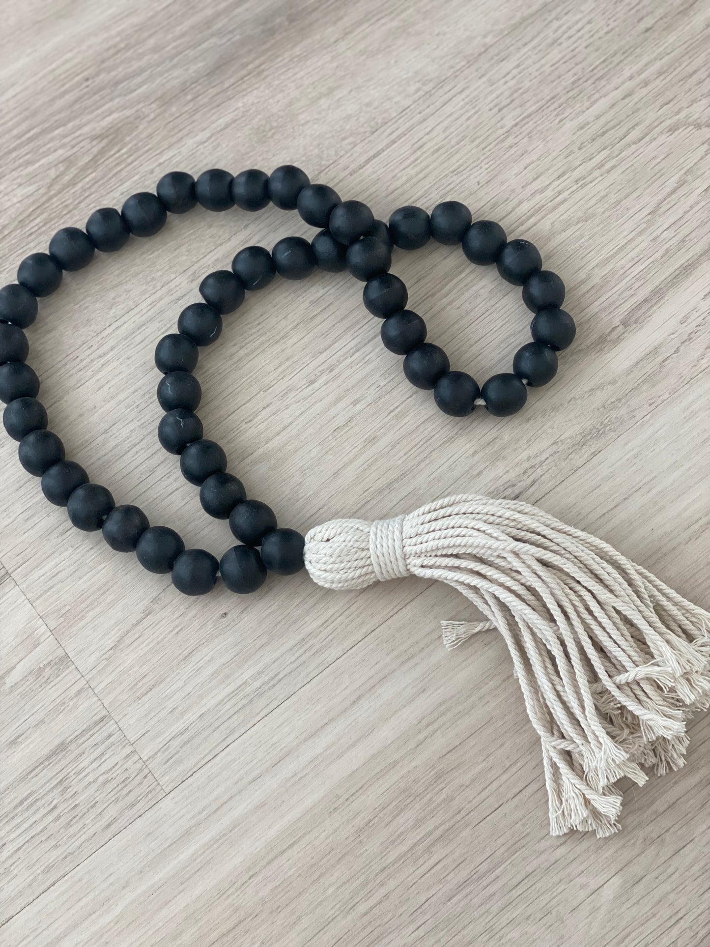 Wooden beads with tassel