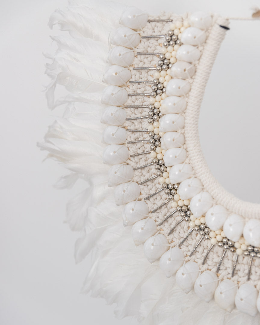 Feather stand with shell and silver beading