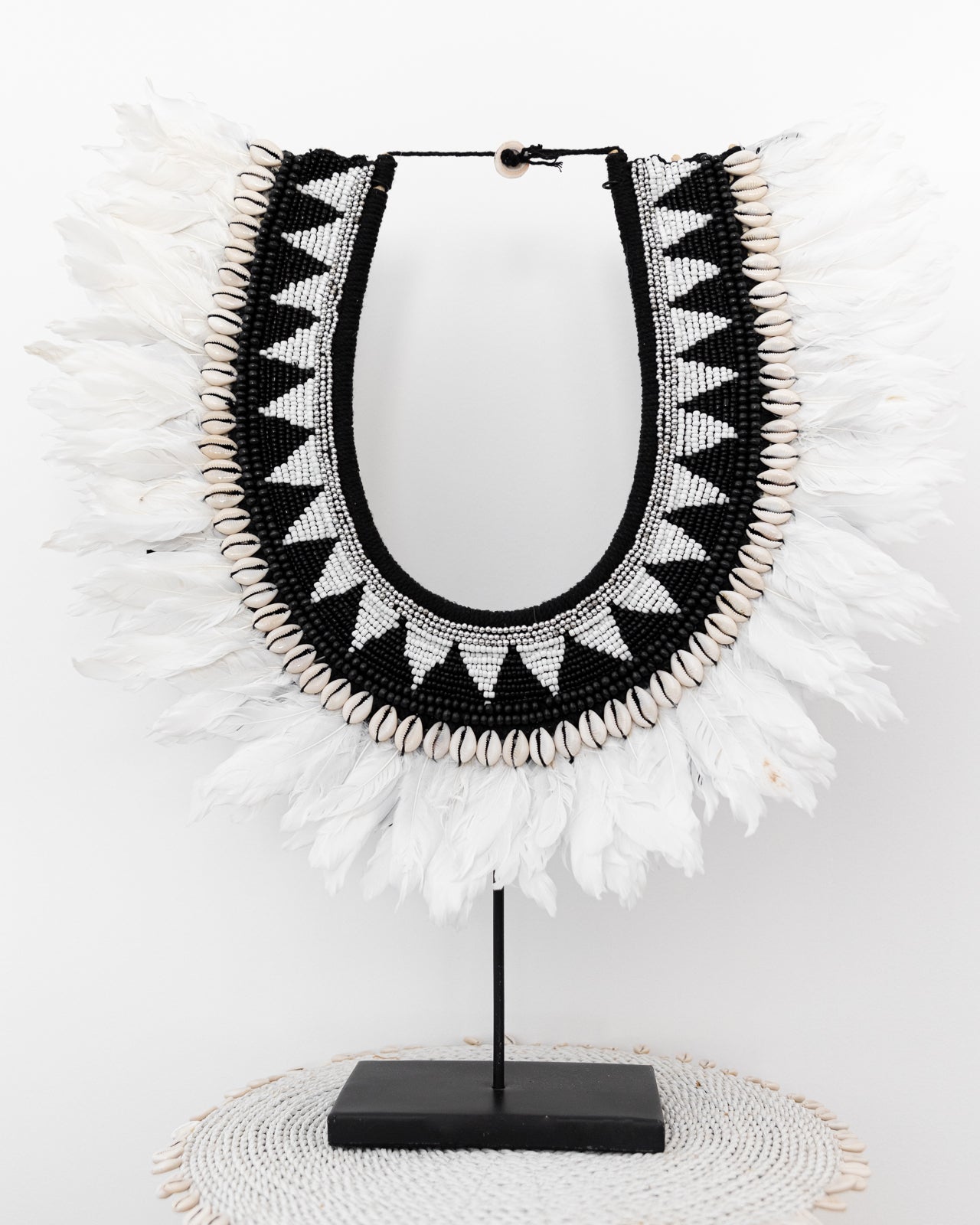 Black/ white beaded feather