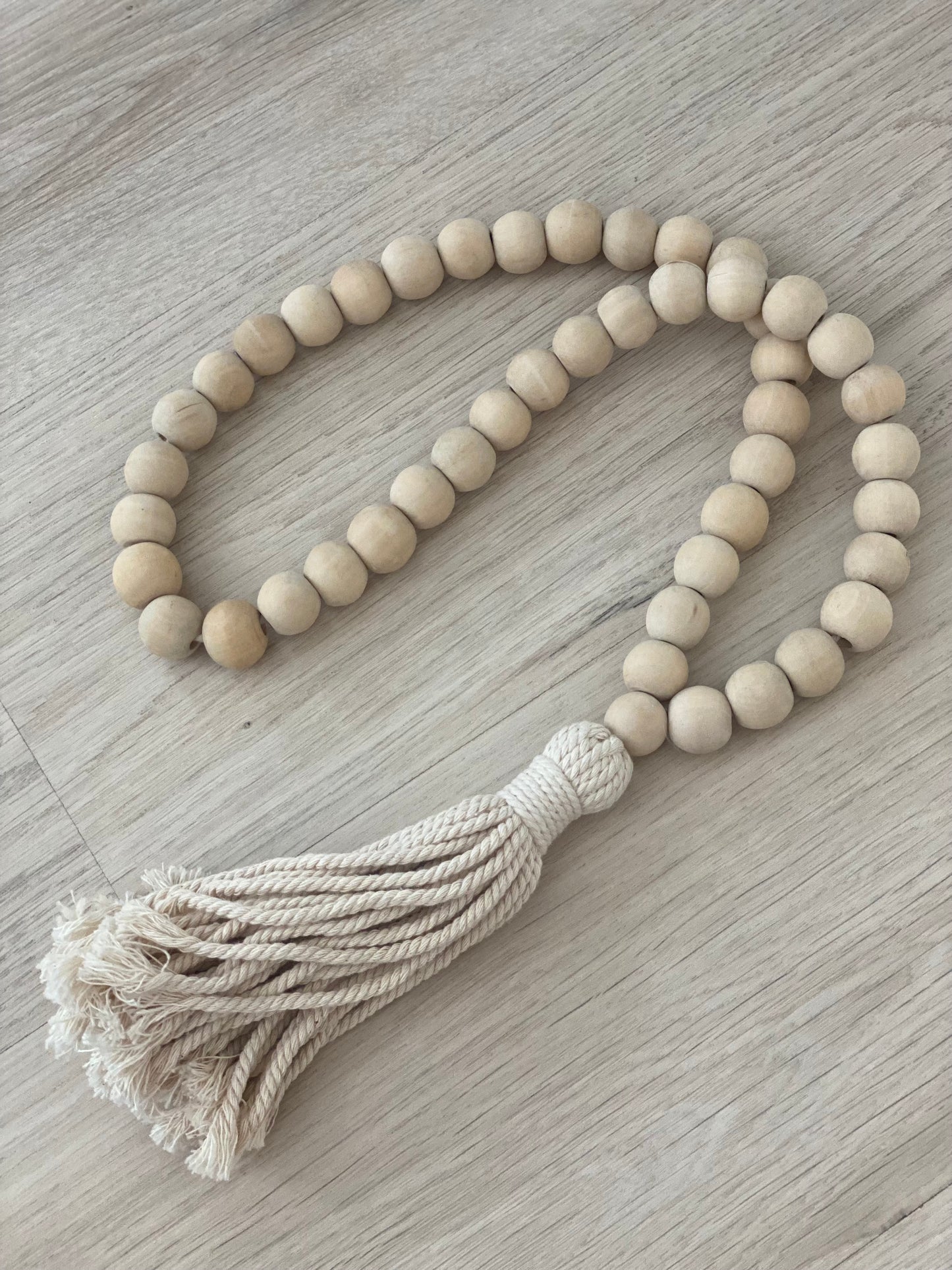 Wooden beads with tassel