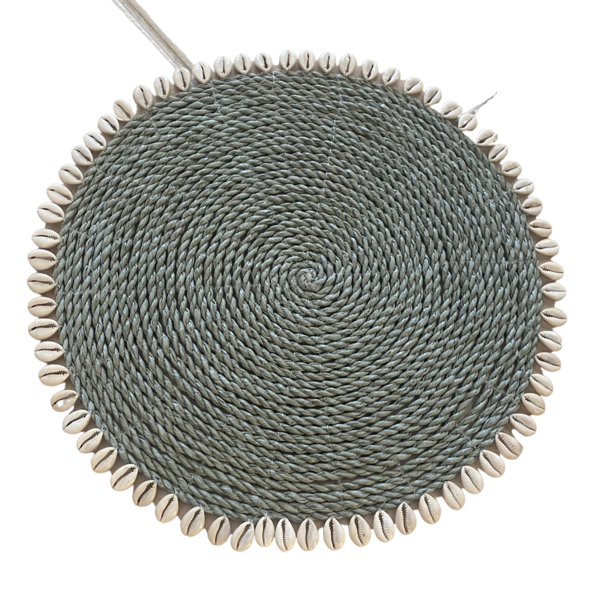 Rattan place mats with cowrie shells