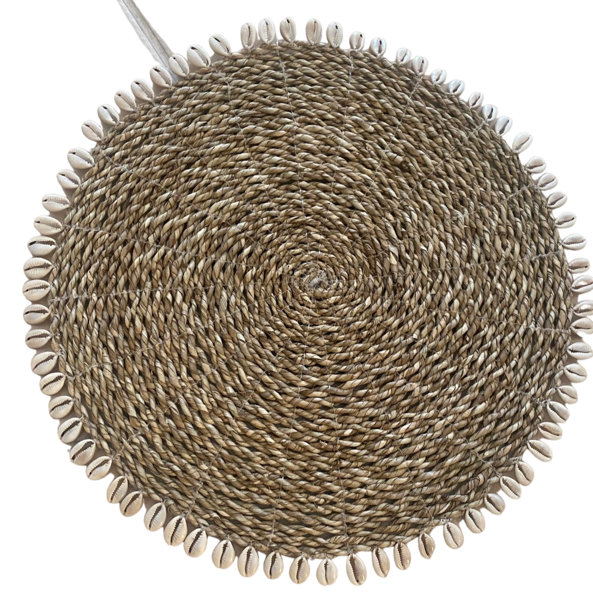 Rattan place mats with cowrie shells