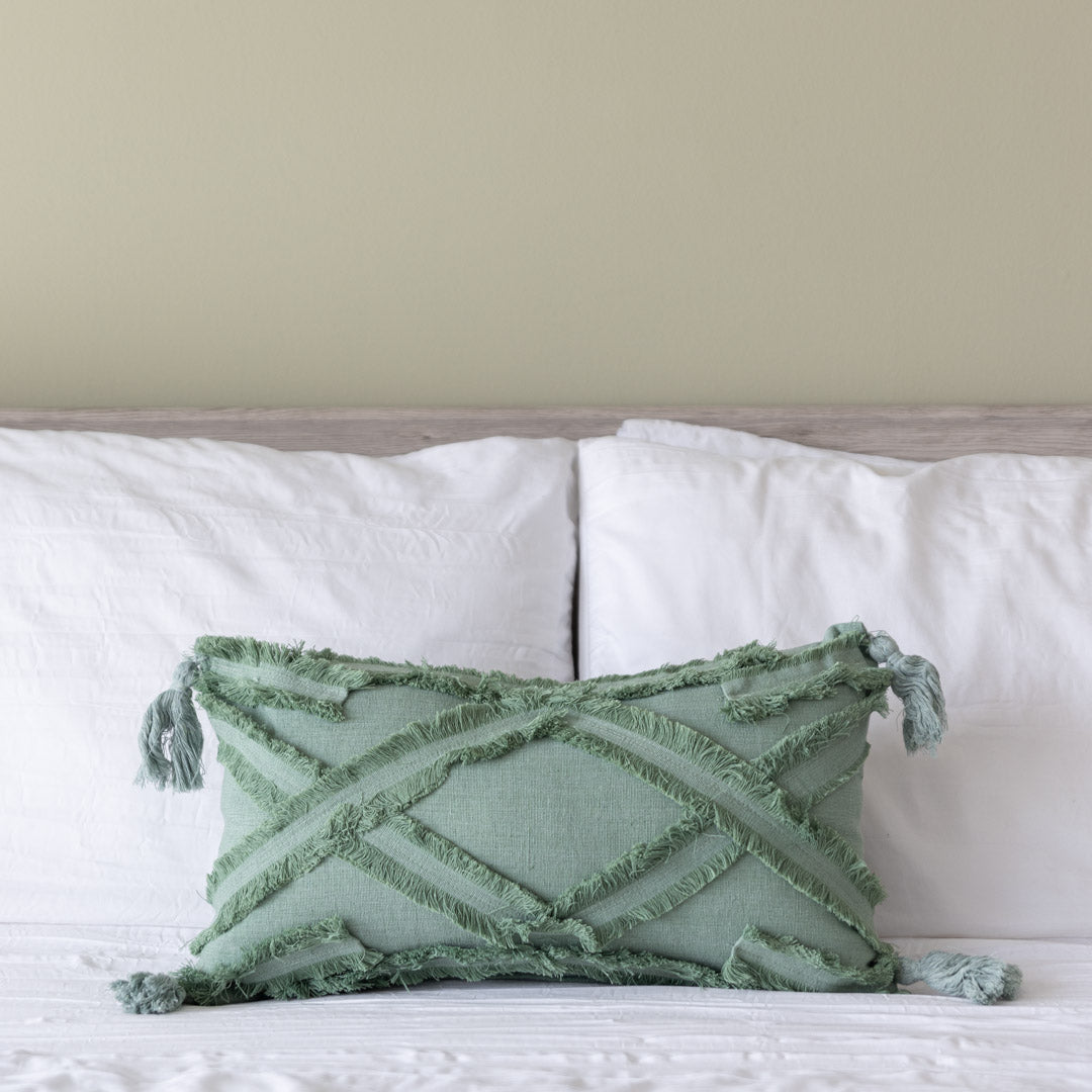 Boho green tassel cushion